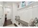 Convenient mudroom with a built-in bench, storage cubbies, and stylish decor at 130 W Pier Way, Fayetteville, GA 30214