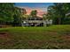 Expansive backyard featuring a spacious deck with multiple levels, perfect for outdoor entertaining at 305 Devilla Trce, Fayetteville, GA 30214