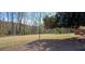 Expansive green backyard with mature trees and landscaping, perfect for outdoor activities at 3119 Colonial Way # H, Atlanta, GA 30341