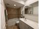 Cozy bathroom featuring a tub with a shower and a vanity with solid surface counter at 3119 Colonial Way # H, Atlanta, GA 30341