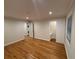 Bedroom with hardwood floors and closet, with an additional laundry area at 3119 Colonial Way # H, Atlanta, GA 30341