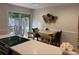Dining area showcasing a sliding glass door to the fenced in patio, and bar seating at 3119 Colonial Way # H, Atlanta, GA 30341