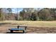 Community green space featuring a baseball field, park benches, and wooded views at 3119 Colonial Way # H, Atlanta, GA 30341