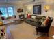 Comfortable living room with a large window seat and hardwood floors at 3119 Colonial Way # H, Atlanta, GA 30341