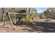 Community playground with swings, a slide, and picnic tables for Gathering enjoyment at 3119 Colonial Way # H, Atlanta, GA 30341