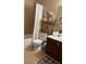 Charming bathroom with a shower/tub combo, vanity, and beach-themed decorations for a relaxing atmosphere at 313 India Ln, Canton, GA 30114