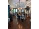 Open-concept dining area with vaulted ceilings and seamless flow into the living spaces at 313 India Ln, Canton, GA 30114