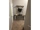 Welcoming hallway with console table and decor; a charming transitional space in this lovely home at 313 India Ln, Canton, GA 30114