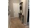 Welcoming hallway with console table and decor; a charming transitional space in this lovely home at 313 India Ln, Canton, GA 30114