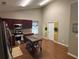 Bright kitchen with stainless appliances, wood countertops, burgundy cabinets and a large wood kitchen island at 313 India Ln, Canton, GA 30114