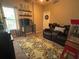 Inviting living room features a bar, comfortable seating, and a cozy rug, perfect for relaxation and entertaining at 313 India Ln, Canton, GA 30114