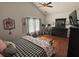 Comfortable main bedroom features a queen bed, vanity, and natural light at 313 India Ln, Canton, GA 30114