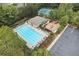 Aerial view of community pool, tennis courts, playground, and parking area at 4561 Jenkins Way, Douglasville, GA 30135