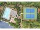 An aerial view showcasing community amenities: pool, tennis courts, playground, and parking at 4561 Jenkins Way, Douglasville, GA 30135