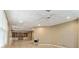 Finished basement featuring built-in shelves, tile flooring and ample room for a variety of activities at 4561 Jenkins Way, Douglasville, GA 30135