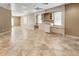Large finished basement featuring a kitchenette, tile flooring, and ample space for various activities at 4561 Jenkins Way, Douglasville, GA 30135