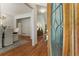 View from the foyer of the dining room with hardwood floors and white trim at 4561 Jenkins Way, Douglasville, GA 30135
