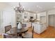 White kitchen featuring an island, stainless steel appliances, and a breakfast nook at 4561 Jenkins Way, Douglasville, GA 30135