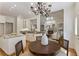 Open concept featuring kitchen, breakfast nook and living room with fireplace at 4561 Jenkins Way, Douglasville, GA 30135
