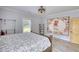 Spacious bedroom with a farmhouse-style decor, plenty of natural light, and LVP flooring at 540 Benton Rd, Covington, GA 30014