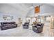 Bright open layout with wood floors, comfortable seating, and easy access to the kitchen and dining areas at 540 Benton Rd, Covington, GA 30014