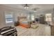 Spacious main bedroom featuring lots of natural light, neutral walls, and gray wood floors at 540 Benton Rd, Covington, GA 30014