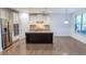 Modern kitchen with stainless steel appliances, granite island, and ample cabinet space at 9872 Cameron Parc Cir, Johns Creek, GA 30022