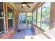 Screened in porch with multiple windows and natural light to enjoy the outdoors at 9872 Cameron Parc Cir, Johns Creek, GA 30022