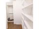 Walk-in closet featuring wall to wall, floor to ceiling shelving at 9872 Cameron Parc Cir, Johns Creek, GA 30022