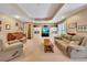 Finished basement area with carpet, a piano, a TV, and seating at 1105 Anemone Nw Way, Acworth, GA 30102