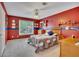 Bedroom with a ceiling fan, closet, and a window providing natural light at 1105 Anemone Nw Way, Acworth, GA 30102