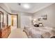 Neutral toned bedroom featuring carpet, a dresser and an attached bathroom at 1105 Anemone Nw Way, Acworth, GA 30102