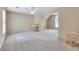 Large bonus room with a rocking chair, desk, chair, and plenty of open space at 1105 Anemone Nw Way, Acworth, GA 30102