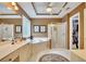 Bright main bathroom featuring a double sink vanity, a large window, and a separate shower and tub at 1105 Anemone Nw Way, Acworth, GA 30102