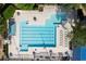Aerial view of the community pool and deck area, with surrounding trees at 1105 Anemone Nw Way, Acworth, GA 30102