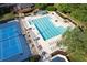Enjoy the community pool, with chairs, tables, shade, and tennis court access at 1105 Anemone Nw Way, Acworth, GA 30102