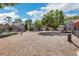 Community dog park with a fenced-in area, benches, and lush landscaping at 1632 Lenox Overlook Ne Rd, Brookhaven, GA 30329