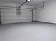 This two car garage is freshly painted and boasts epoxy flooring at 1632 Lenox Overlook Ne Rd, Brookhaven, GA 30329