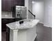 Bright kitchen island featuring granite countertops and stainless steel appliances at 1632 Lenox Overlook Ne Rd, Brookhaven, GA 30329