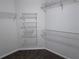 A spacious walk-in closet with multiple wire shelves provides ample storage at 1632 Lenox Overlook Ne Rd, Brookhaven, GA 30329