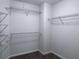 A spacious walk-in closet with multiple wire shelves provides ample storage at 1632 Lenox Overlook Ne Rd, Brookhaven, GA 30329