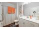 Clean bathroom featuring a shower, vanity with sink, and coordinating decor at 2141 Slick Stone Dr, Snellville, GA 30078