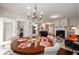 Elegant dining room with stylish chandelier and access to the living area and bedroom at 2141 Slick Stone Dr, Snellville, GA 30078