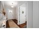 Welcoming foyer with hardwood floors, a decorative rug, and views into the home at 2141 Slick Stone Dr, Snellville, GA 30078