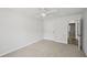 Bedroom with plush carpet and view of doorway at 3463 Dunbar Ln, Suwanee, GA 30024