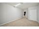 Bedroom featuring neutral walls, plush carpet, and a doorway leading to another room at 3463 Dunbar Ln, Suwanee, GA 30024