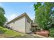 Exterior view of a home with multi-tiered decks and lush backyard landscaping at 3463 Dunbar Ln, Suwanee, GA 30024