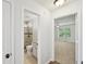 Hallway view of the updated bathroom and main bedroom at 3463 Dunbar Ln, Suwanee, GA 30024