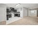 This kitchen boasts dark cabinets, white appliances, and tiled floor at 3463 Dunbar Ln, Suwanee, GA 30024