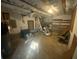 Unfinished basement with exposed ceiling, water heater, and ductwork at 4865 Surrey Dr, Roswell, GA 30075